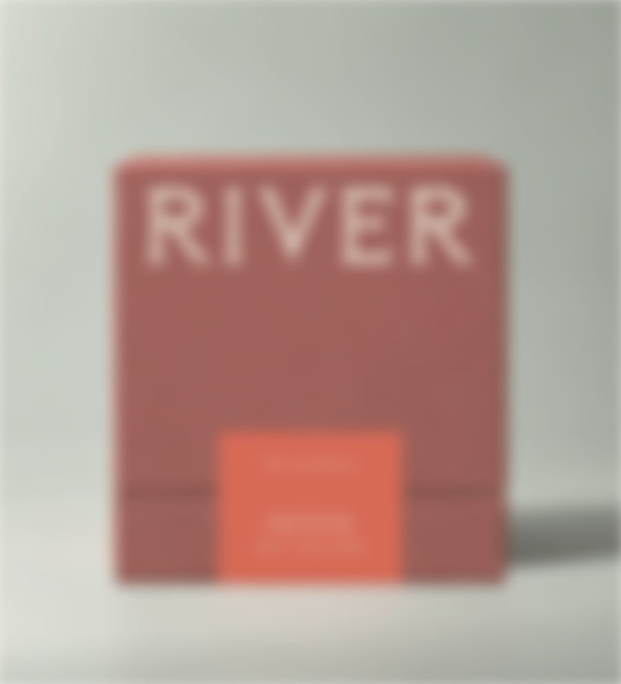 Ceremonial Candle box in red with an orange-red label