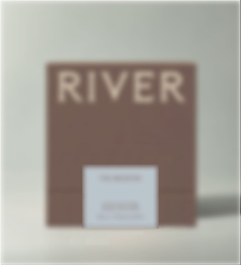 Ceremonial Candle box in brown with a pale blue label